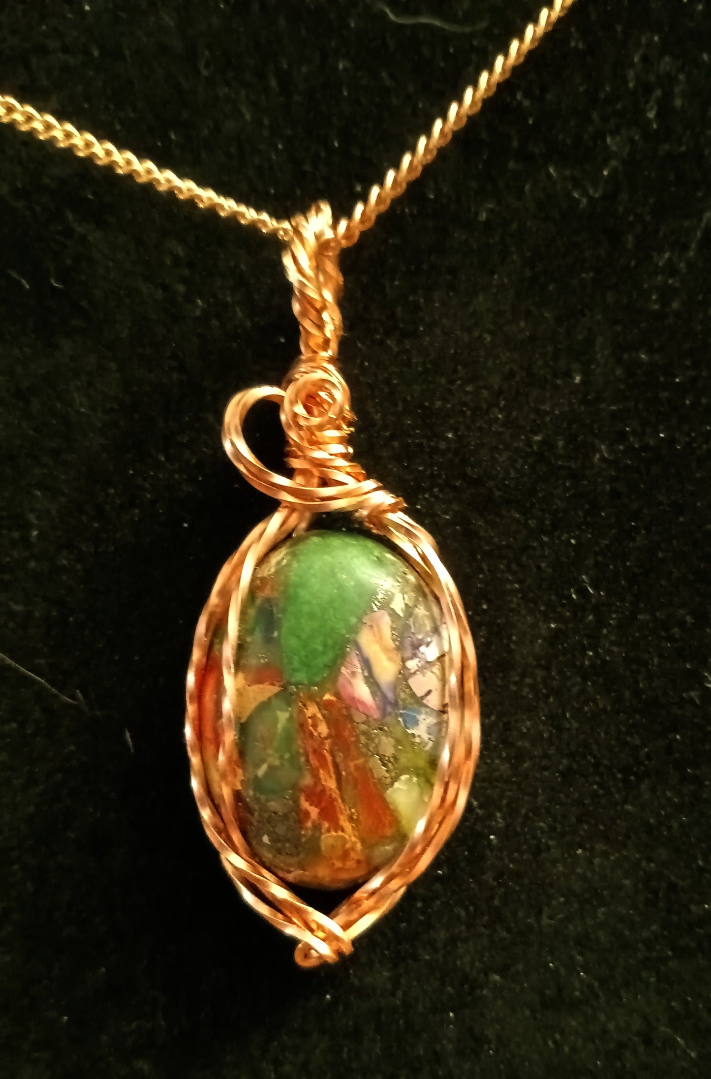 Multicolor Sea Impediment Jasper pendant.